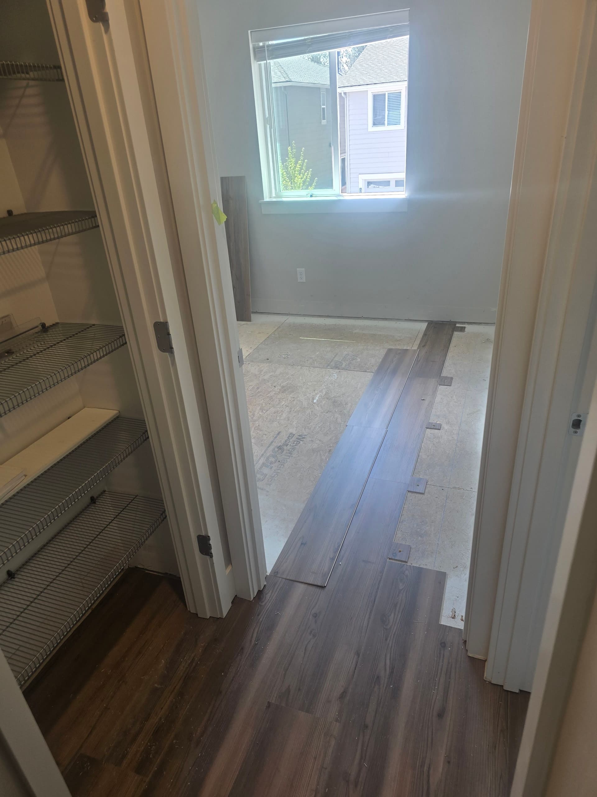Gallery photos for Stained Carpet to Stainmaster Waterproof Flooring in Bend: Image #2