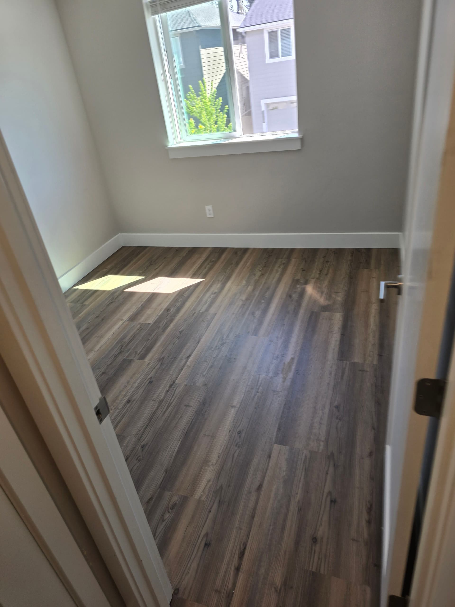 Gallery photos for Stained Carpet to Stainmaster Waterproof Flooring in Bend: Image #6