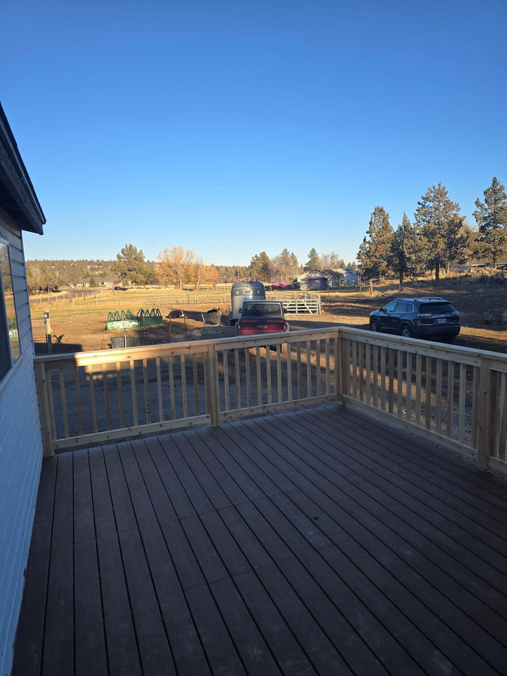 Gallery photos for Full-Length Deck Install on a Bend OR Rural Home: Image #1