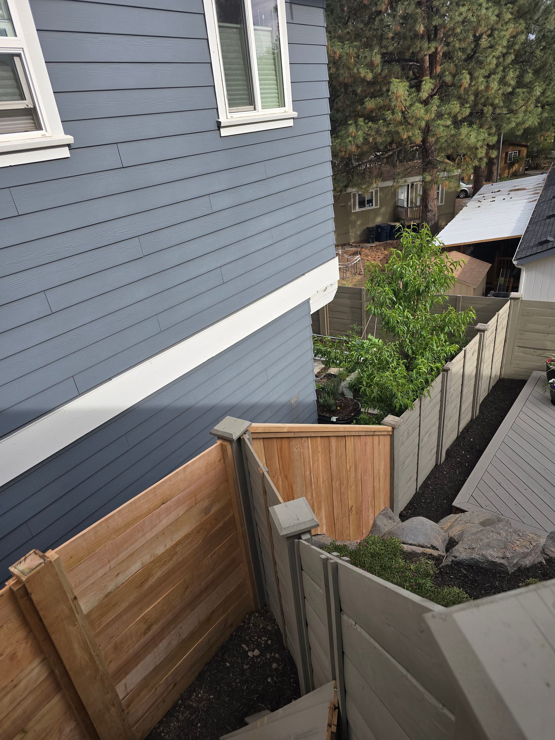 Gallery photos for Custom 5-Foot Cedar Fence Built Up a Rocky Hillside: Image #1